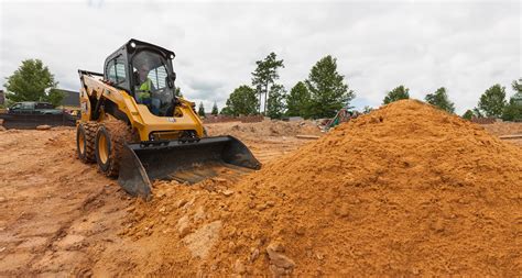 ride on top skid steer dimensions|full size stand on skid steer.